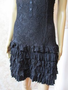 Black vintage lace dress with some stretch.  It has bra straps, a scoop neck with decorative buttons.  The skirt is teired and it is lined. Bust flat;  17" Length;  35" Black Dress Lace, Vintage Lace Dress, Evening Dress Black, Cocktail Vintage, Cocktail Dress Vintage, Lace Dress Vintage, Black Evening Dresses, Decorative Buttons, Lace Dress Black