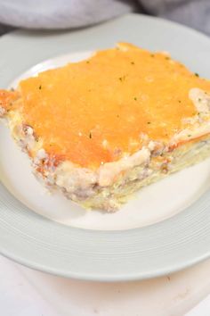 a slice of lasagna on a white plate