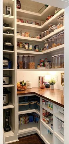 an open pantry with lots of food in it