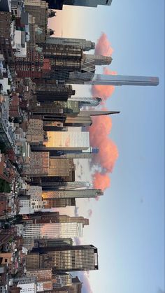 the sky is reflected in the buildings on the other side of the cityscape