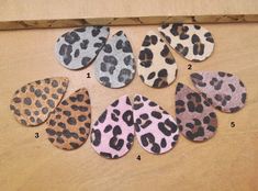 six pairs of leopard print leather ear clips