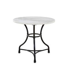 a white marble table with black metal legs and an iron frame around the top, against a white background