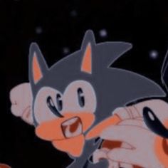 an animated image of sonic and tails holding each other