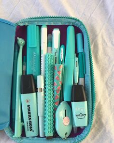 a blue case filled with lots of different items