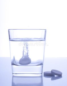 Aspirin. Coated tablet on white background and glass filled with water #Sponsored , #Affiliate, #PAID, #Coated, #white, #filled, #tablet Medicine Images, Stock Photography Free, Flyer Design, Glass Of Milk, White Background, Tablet, Stock Images, Drinks, Glass