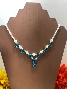 Gorgeous blue Swarovski crystal with white pearl necklace with matching earrings  16" necklace 2 1/2" earrings 16 Necklace, 2 Earrings, White Pearl Necklace, Beaded Necklaces, White Pearl, Chain Styles, Matching Earrings, Pearl White, Swarovski Crystal