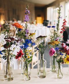 flowers in vases are displayed on the instagram page