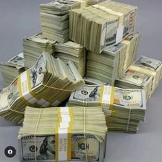 stacks of money sitting on top of each other