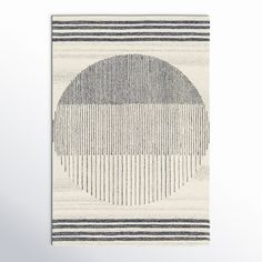 an abstract rug with black and white stripes on it, in the shape of a circle