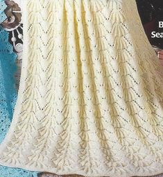 a crocheted blanket is shown on the cover of a magazine