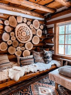 a living room filled with lots of wooden furniture and decor on top of each other