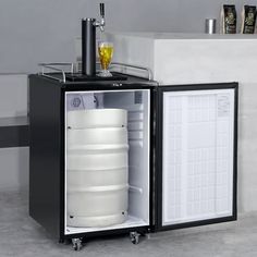 a small refrigerator with some drinks in it