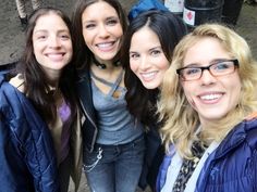 four women are posing for a picture together