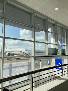 an airplane is parked at the airport terminal