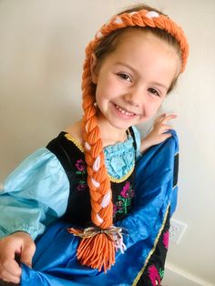 These Anna braids are as loveable and adorable as Elsa's little sister herself! Perfect for Halloween, dress-up, or the perfect gift! Your little princess will be in ice palace heaven!   Soft, elasticized braided headband make it as comfortable as it is cute! Hidden elastic fits snugly and comfortably, one size fits most.    What's a Frozen princess without her Snow Queen sister?  Find a discount on the Elsa and Anna set here:  Or purchase Elsa seperately:   *Always FREE shipping!* Anna Hairstyle Frozen, Anna Hairstyle, Yarn Wig, Rapunzel Costume, Ice Palace, Anna Dress, Frozen Anna, Frozen Princess, Toddler Halloween