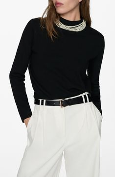 Every closet craves this sophisticated mock-neck sweater crafted in a fine-gauge knit for a closer fit. 25" length (size medium) Mock neck Long sleeves 50% viscose, 28% polyester, 22% polyamide Hand wash, tumble dry Imported Elegant Black Fitted Mock Neck Top, Chic Black Stretch Mock Neck Top, Chic Fitted Knit Mock Neck Top, Black High Neck Sweater With Ribbed Cuffs, Luxury Black Fine Knit V-neck Sweater, Mock Neck Sweater, Fabric Gift Bags, Nordstrom Store, Free Fabric