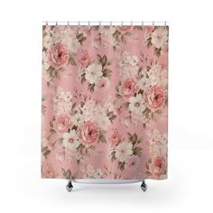 a shower curtain with pink and white flowers on the outside, in front of a white background