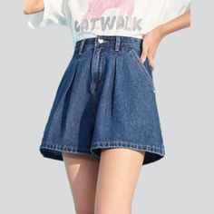 From 2023 Summer Collection. introducing the latest in streetwear style fashion our pleated waistband women's denim shorts! Crafted with the modern fashionista in mind. these stonewashed. wide-leg. high-waist shorts are the perfect blend of comfort and sophistication. Featuring a zipper and button closure. these shorts are made of premium quality viscose fabric for ultimate durability.Why These Shorts Should Be Your Next PurchaseYou'll be sure to make a statement in these shorts. designed to be Dark Wash High-waisted Streetwear Shorts, Dark Wash High Waist Shorts For Streetwear, High-waist Dark Wash Streetwear Shorts, Dark Wash High Waist Streetwear Shorts, High Waist Dark Wash Shorts For Streetwear, High-waisted Shorts For Spring Streetwear, Dark Wash Wide Leg Jean Shorts For Streetwear, Wide Leg Dark Wash Jean Shorts For Streetwear, Wide Leg Denim Blue Shorts For Streetwear