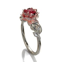 "This amazing engagement ring positively radiates beauty and strength. With its vibrant colors and lovely floral design, it's sure to be a conversation starter. Choose this piece of fine jewelry for someone with a unique spirit. The narrow band is created from gleaming, 14kt white gold, with a symmetrical design of white gold leaves at the top, which surround a beautiful lotus flower crafted from warm rose gold. At the very center sits a glistening, vivid ruby. ★See A Video Of This Amazing Ring Cute Engagement Rings, Chique Outfits, Pola Gelang, Jewelry Accessories Ideas, Magical Jewelry, Dream Engagement Rings, Ring Ideas, Jewelry Lookbook, Fancy Jewelry