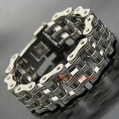 a close up of a bike chain bracelet