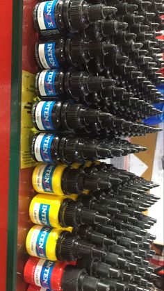 many different types of screwdrivers on display in a store