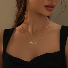 Sleek and elegant, our Mon Petit Name Necklace creates an effortless signature look that is stunning next to your skin. Personalize your necklace with your name or surprise them with a meaningful gift today. Gold Name Necklace Aesthetic, Name Jewelry Personalized, Name Chain Gold, Name Necklace Aesthetic, Necklaces With Names, Name Gold Necklace, Necklace Name Design, Chains Aesthetic, Necklace With Name