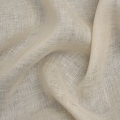 an image of a white fabric textured with light beige color and soft lines on it