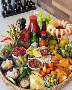 a basket filled with different types of food and condiments on top of a table