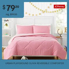 a bed with pink comforter and pillows on it for $ 79 20 regt