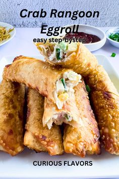 a white plate topped with fried food and dipping sauce