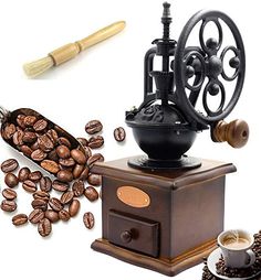 an old fashioned coffee grinder surrounded by coffee beans and other things to make espresso