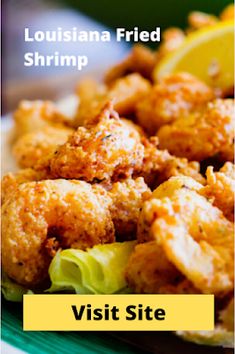 fried shrimp with lettuce and lemon wedges