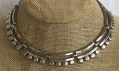 "Featuring this stylish silver tone modern choker necklace.  It is adjustable and measures from 13\"-14-1/2\".  The necklace will fit a smaller neck and has a hook clasp.  It is in very good vintage condition.  The necklace has a little weight to it." 90s Choker, Chunky Silver Necklace, Neck Pieces Jewelry, Choker Designs, 2024 Style, Necklace Layering, Neck Piece, Hook Clasp, Chunky Necklace