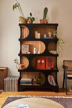 this modern meets rustic bookshelf will transform your library into a striking display Unique Mantle Decor, Cozy Foyer Entry Ways, Midcentury Eclectic Decor, Midcentury Modern Office Ideas, Curated Loft, Midcentury Modern Bedroom, Rehab House, Furniture Aesthetic, Rustic Bookshelf