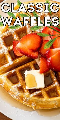 a waffle topped with strawberries and butter