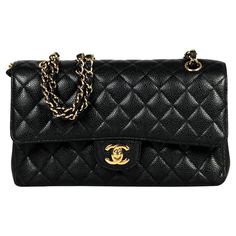 Chanel Black Caviar Leather 10" Medium Double Flap Classic Bag with Goldtone Hardware Made In: France Year of Production: 2021 Color: Black, gold Hardware: Goldtone Materials: Caviar leather, metal Lining: Black leather Closure/Opening: Flap top with CC twistlock and snap flap under Exterior Pockets: Half moon patch pocket Interior Pockets: Zipper pocket on top flap, back section under top flap, two wall pockets in middle section, front section Exterior Condition: Excellent pre-owned condition w Classic Everyday Flap Bag With Gold-tone Logo Plaque, Classic Leather Bag With Gold-tone Logo Plaque, Leather Flap Bag With Gold-tone Logo For Everyday Use, Formal Black Shoulder Bag With Gold-tone Logo Plaque, Luxury Caviar Leather Evening Bag, Gold Leather Flap Bag With Gold-tone Logo, Everyday Luxury Caviar Leather Bag, Luxury Caviar Leather Bag For Everyday, Black Caviar Leather Evening Bag