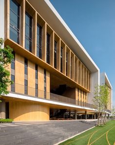 a large building with many windows on the front and side of it's sides