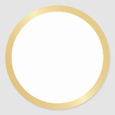 a white circle with gold trim on the edges is shown in front of a gray background