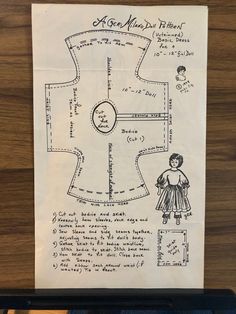 a piece of paper with an image of a woman's dress on it and instructions for sewing