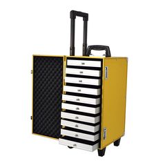 a yellow and black tool box with six drawers on it's side, open to reveal the contents