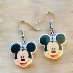 Acrylic Mickey Mouse Earrings White Backing. Material- Acrylic Charm Measures- .75” Long X .8” Wide Handmade Earrings Acrylic Disney Earrings, Mickey Mouse Outline, Jack Skellington Santa, Silhouette Head, Mickey Mouse Silhouette, Mouse Earrings, Mickey Earrings, Mickey Mouse Pumpkin, Disney Earrings