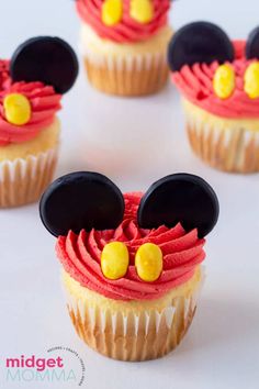 mickey mouse cupcakes with red frosting and black ears