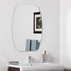 a bathroom sink with a mirror above it