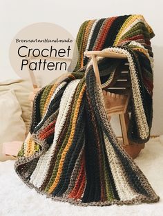 there is a crochet blanket on the chair