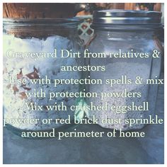 two jars filled with dirt sitting on top of a table