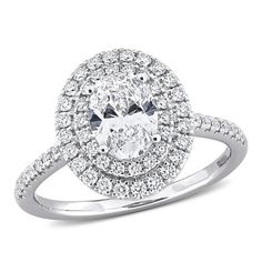 an oval shaped diamond engagement ring with double halos