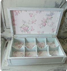 an open tea box sitting on top of a table