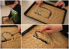 a child is playing with rice in the shape of a smiley face on a tray