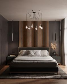 a large bed sitting under a tall wooden headboard next to a wall mounted light fixture