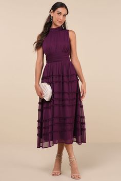 You'll always feel and look your best when you step out for the day in the Happily Sweet Purple Mock Neck Backless Midi Dress! Airy woven chiffon shapes this darling dress that features a sleeveless, lightly gathered bodice and a sophisticated mock neckline. A fitted, banded waist sits atop a breezy, A-line skirt that boasts tiers of ruffled accents as it falls to a chic midi hem. Long tying sashes secure above an open-back cutout for an ultra-alluring finish. Hidden side zipper/clasp. Fit: This garment fits true to size. Length: Mid-calf length. Size medium measures 50.5" from shoulder to hem. Bust: Great for any cup size. Waist: Fitted - very fitted at natural waist. Hip: Not Fitted - fuller skirt allows room for hips. Undergarments: May be worn with an adhesive bra, petals, or no bra. F Plum Dress Outfit, Purple Cocktail Dress, Backless Midi Dress, Gathered Bodice, Plum Dress, Darling Dress, Mini Sweater Dress, Sweater Dress Midi, Mock Neckline